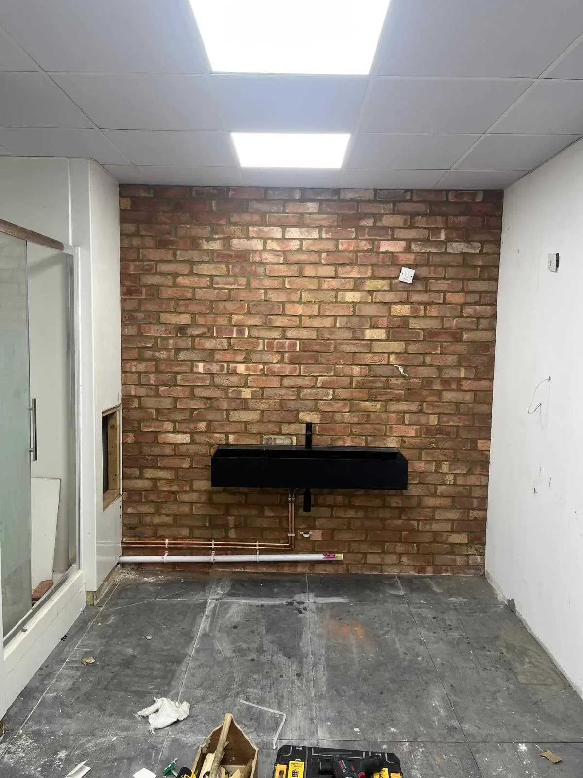 Bathroom area before remedial plumbing work