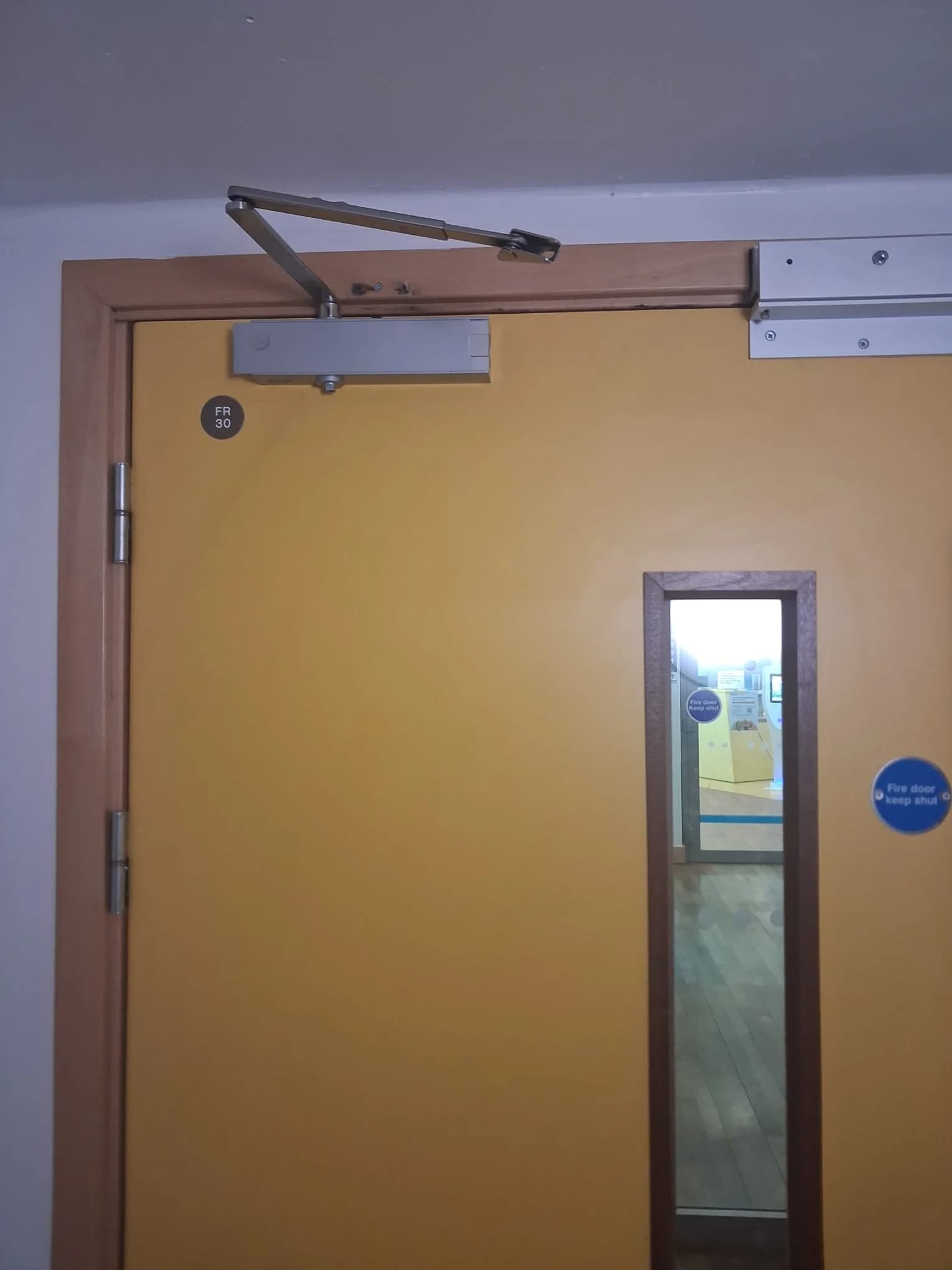 Internal door before property maintenance repair