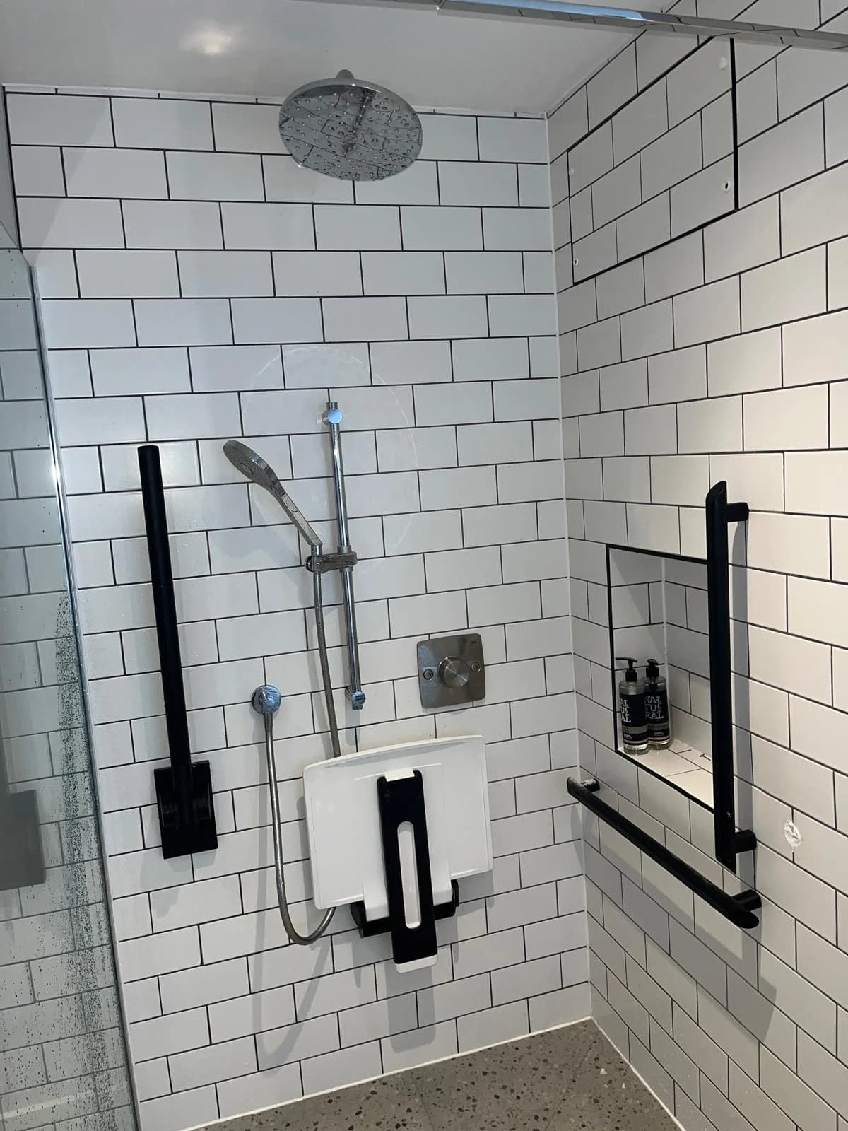 Shower area after completed plumbing work