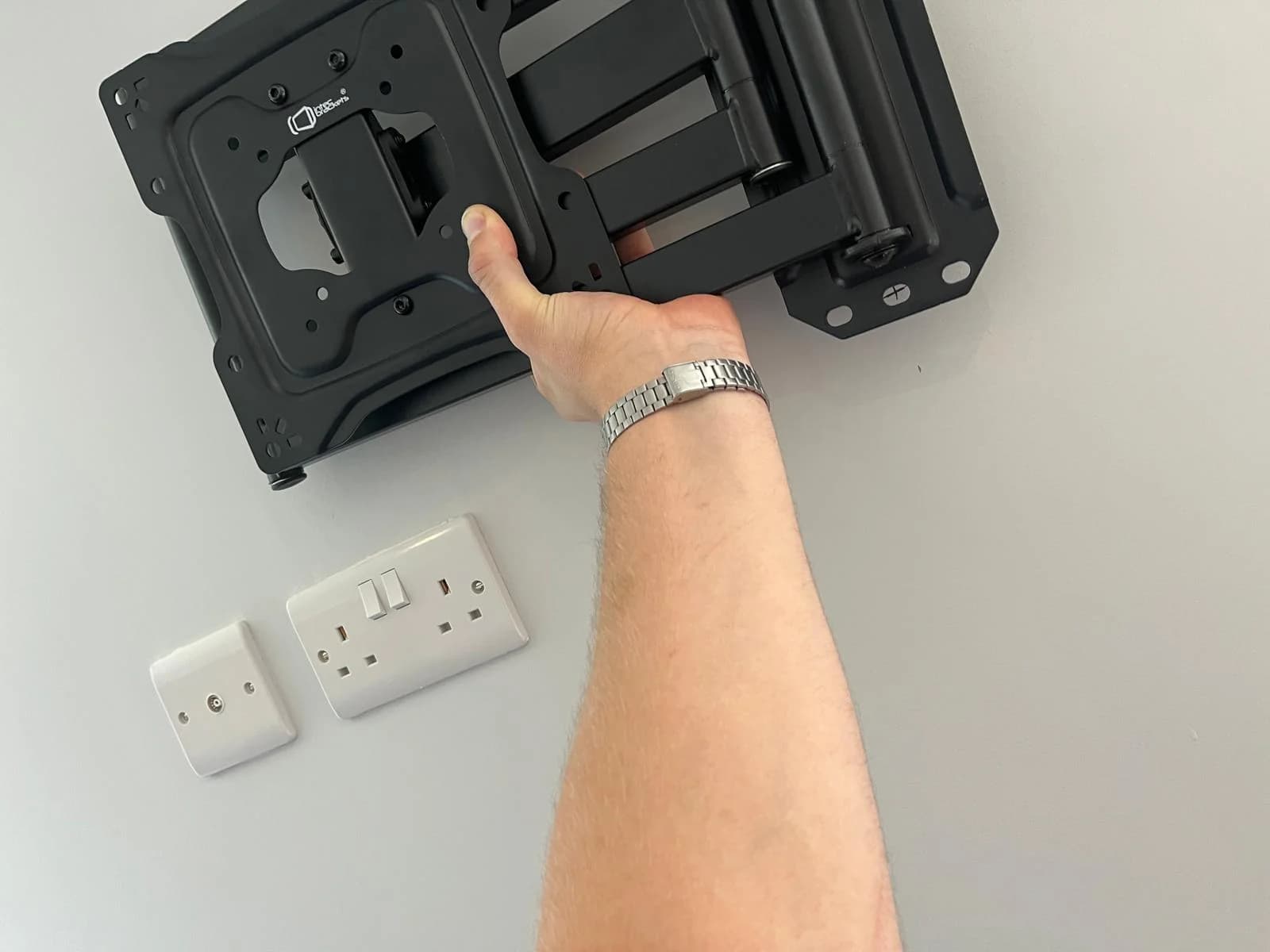 TV mounting installation in progress