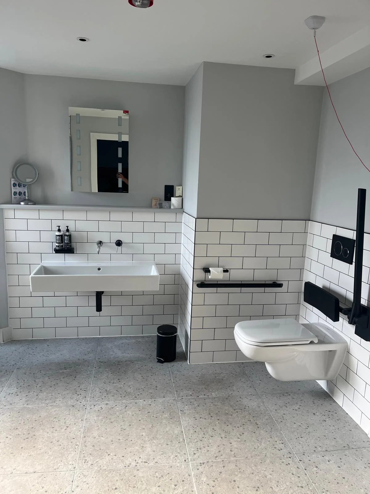 Bathroom basin and toilet installed after plumbing work