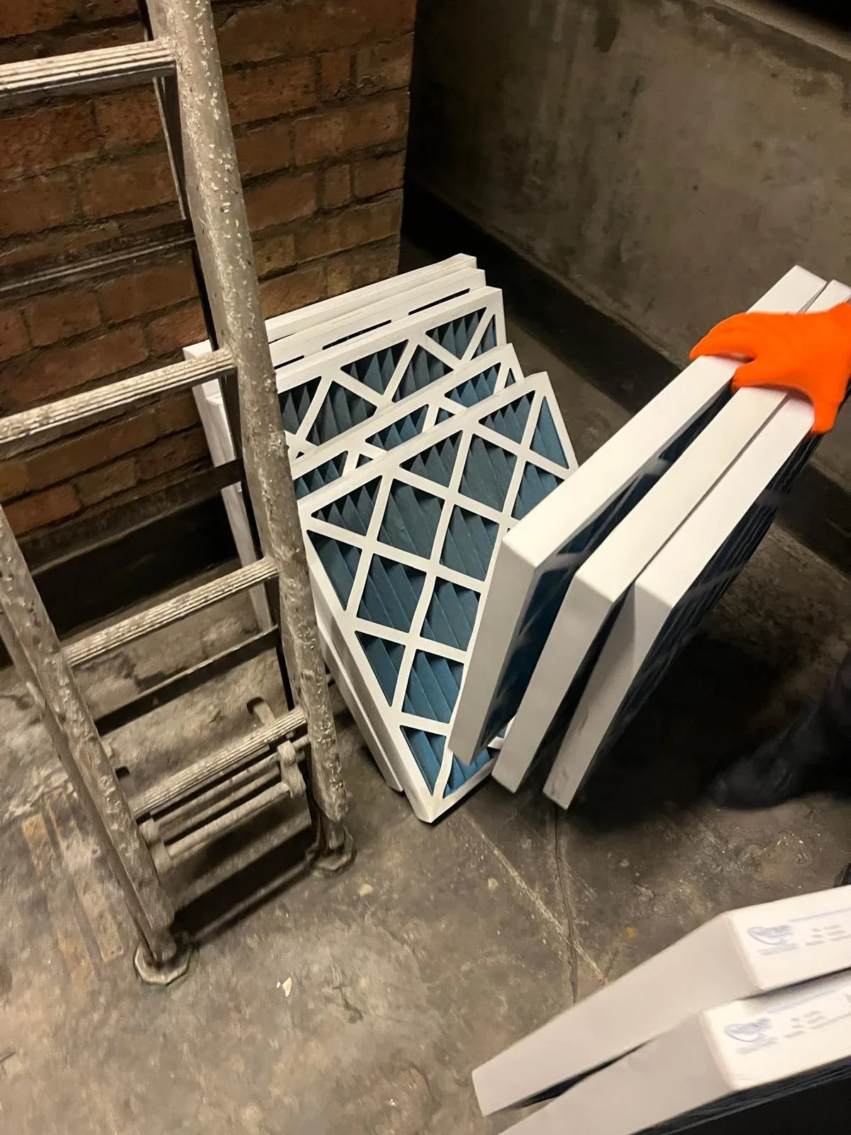 Commercial ventilation filter removed for inspection