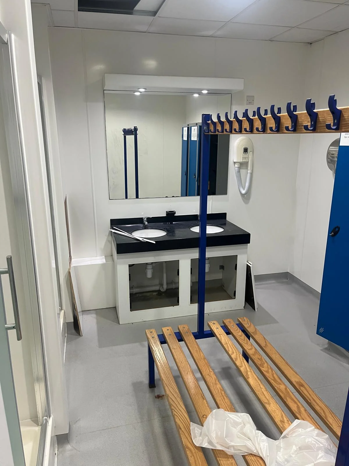 Completed commercial washroom basin installation