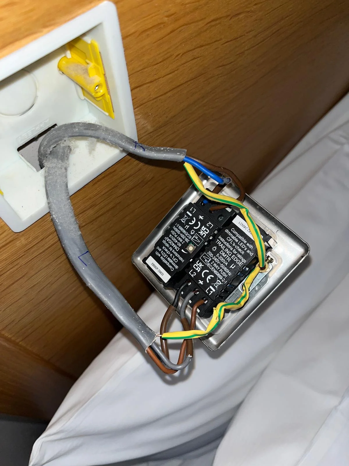 Electrical socket wiring checked during remedial work