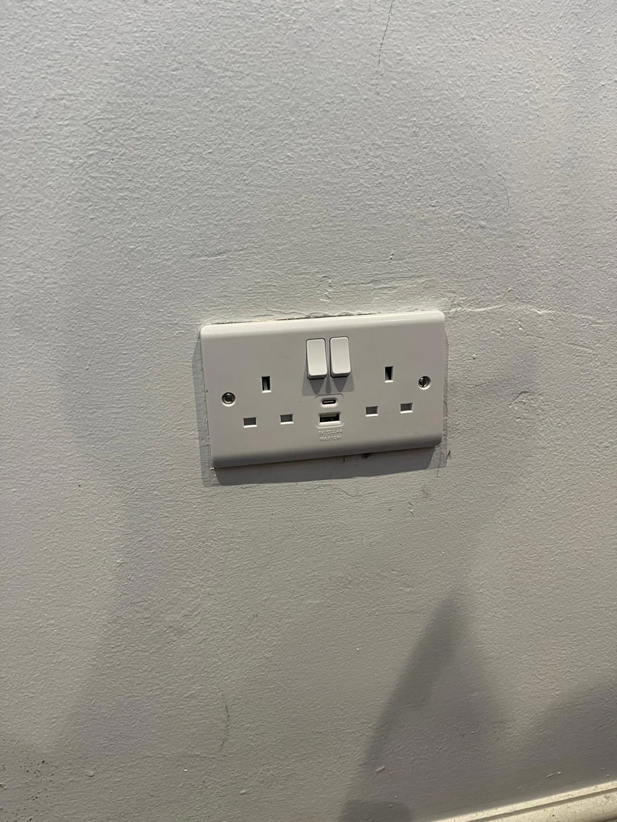 New double socket with USB-A and USB-C charging outlets after installation