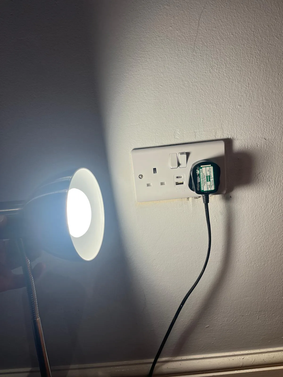 New USB-C double socket demonstrated in use after installation