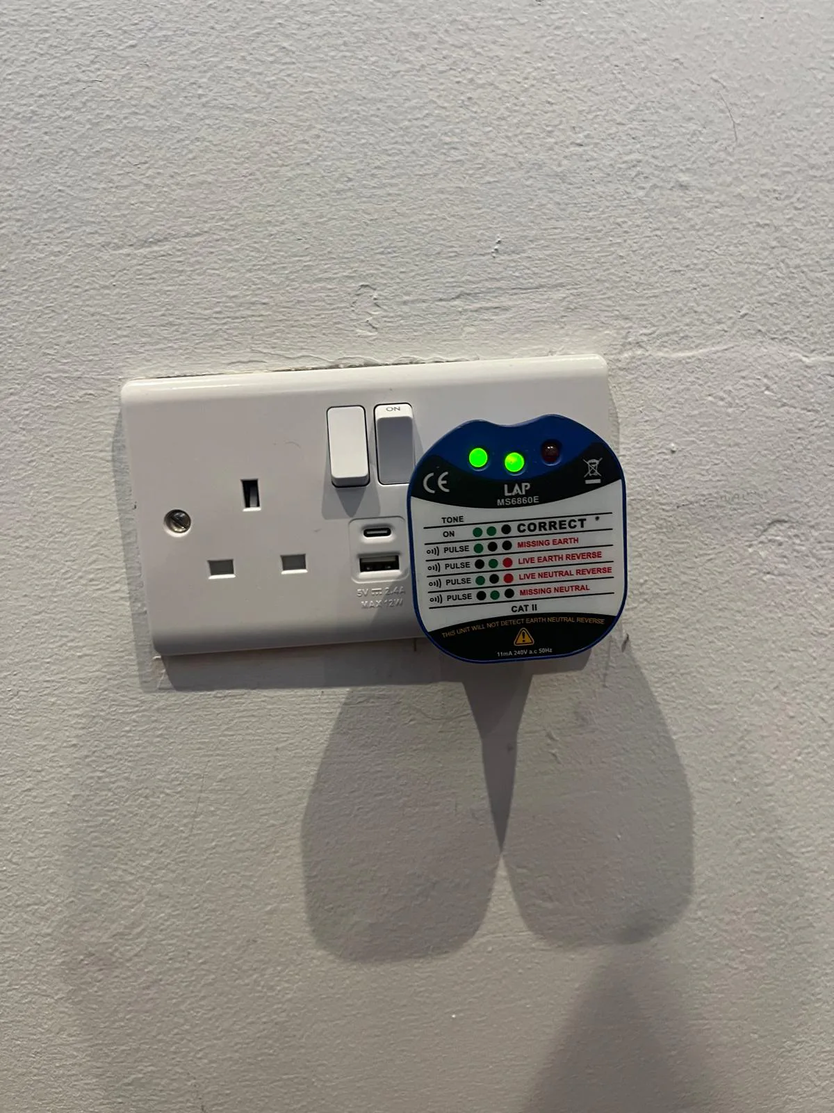 Electrical socket tester checking new USB and USB-C double socket